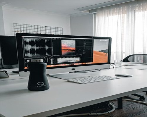 Water bottle on a work desk setup