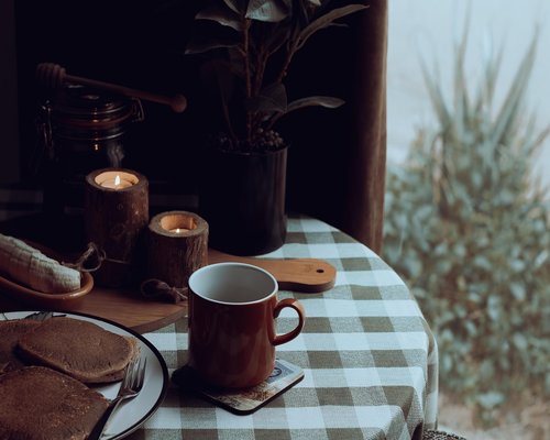 Simple home breakfast in Thailand on a wooden table